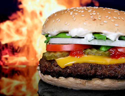 hamburger in front of flame